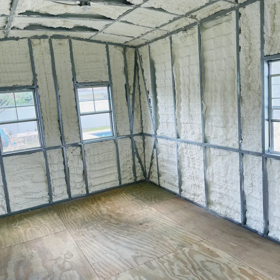 Closed-cell spray foam insulation applied to wall cavities in a residential project in Lathrop